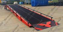 PICTURE OF THE MOVABLE LOADING PLATFORM WITH THREE SIDES UNLOADING