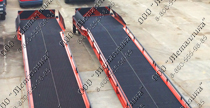 PICTURE OF THE MOVABLE LOADING PLATFORM WITH THREE SIDES UNLOADING